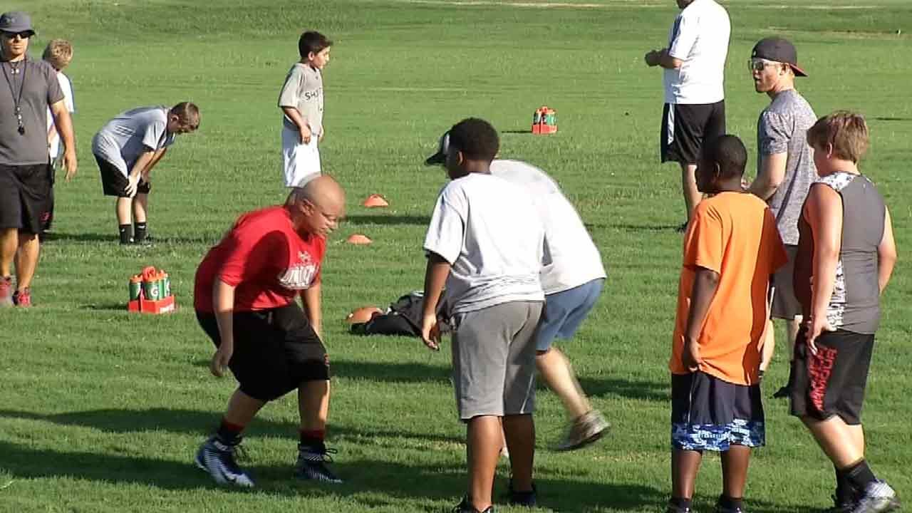 OK Youth Football Players Adjust To Heat As Practice Begins