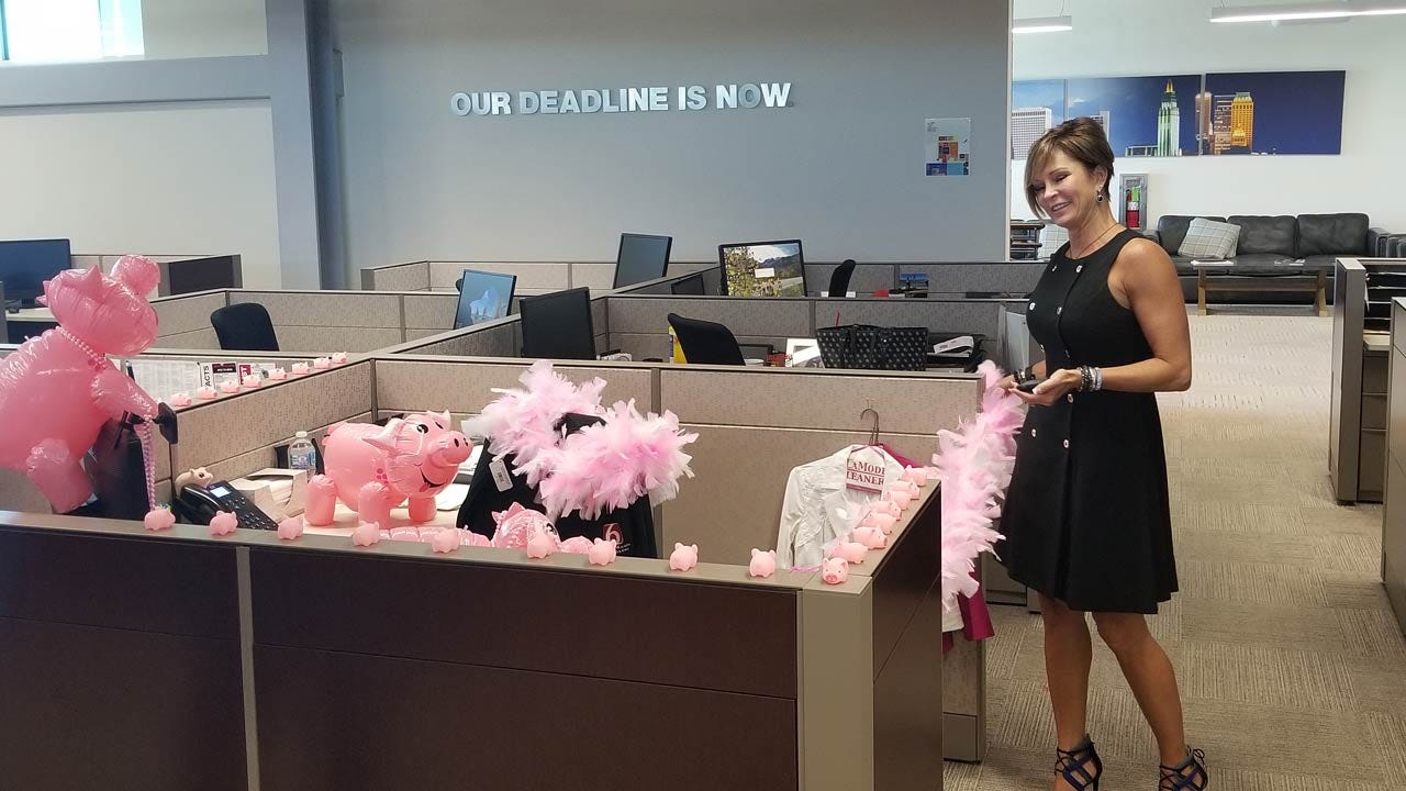 Co-Workers Help Lori Fullbright Prepare To Kiss A Pig For Charity