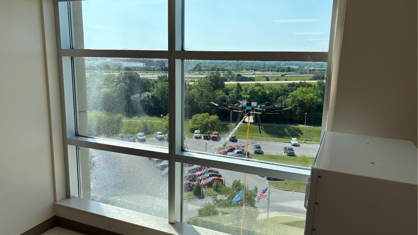 Drone Sprays Window