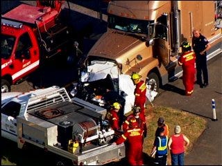Tractor-trailer truck collision kills one