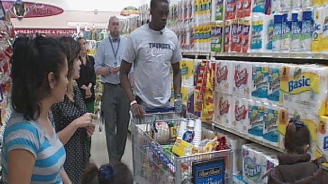 Thunder's Reggie Jackson Shops With Needy OKC Family