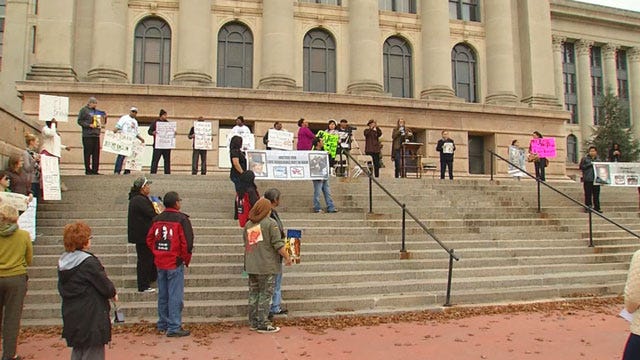 Dozens Protest At State Capitol With Rodriguez Family