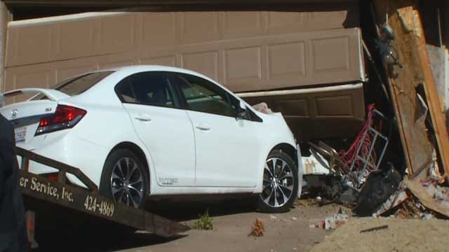 Man Smashes Car Into House Garage In Edmond