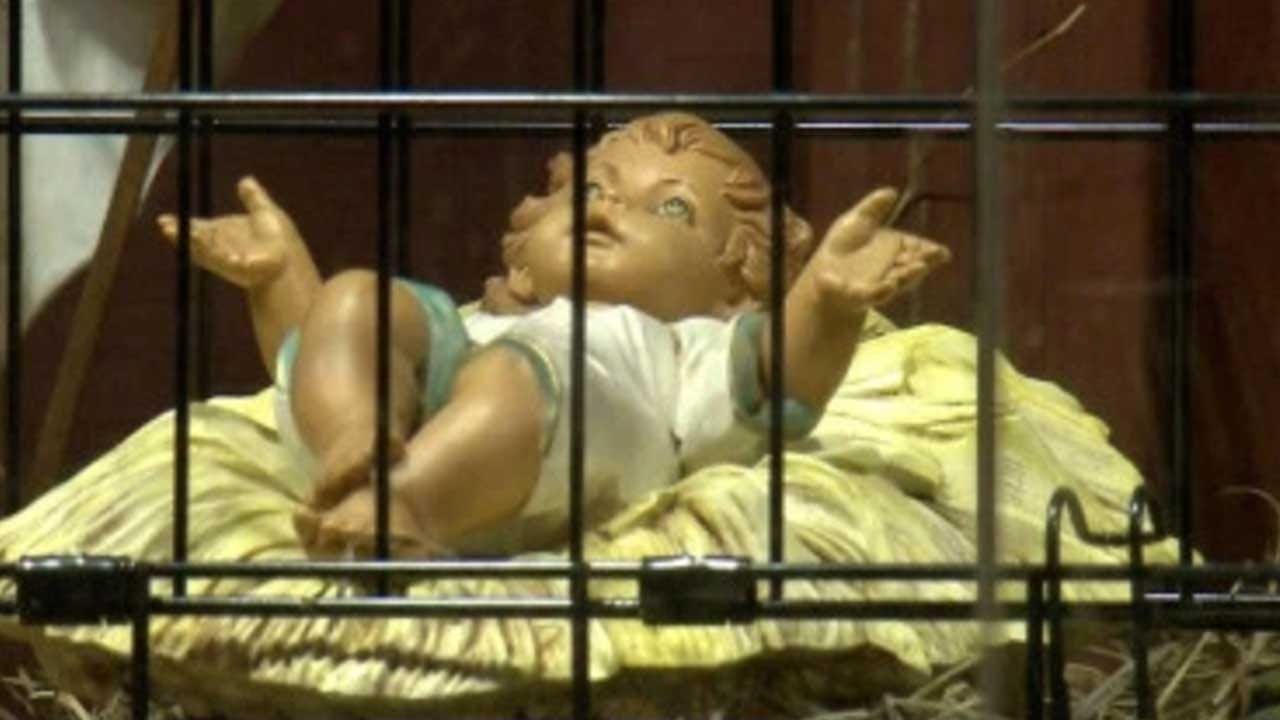 Baby Jesus Placed In Cage In Church's Immigration-Themed Nativity Scene