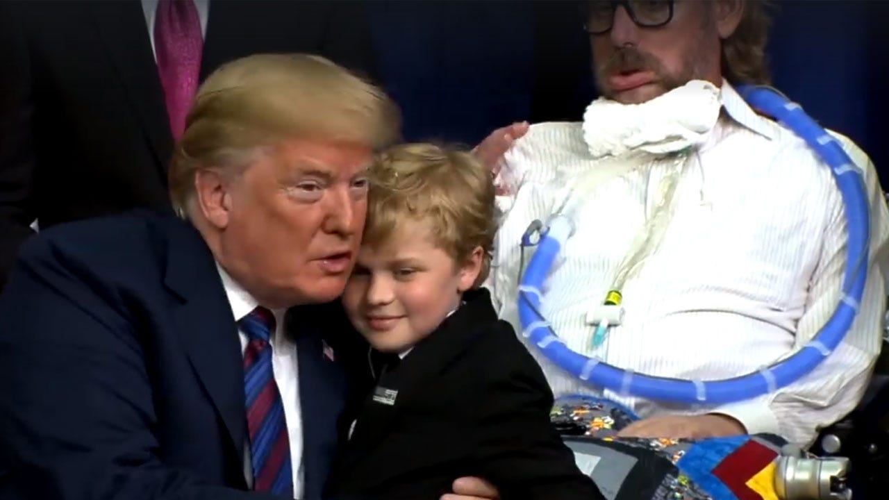 Child Battling Muscular Dystrophy Hugs Trump During 'Right To Try' Signing