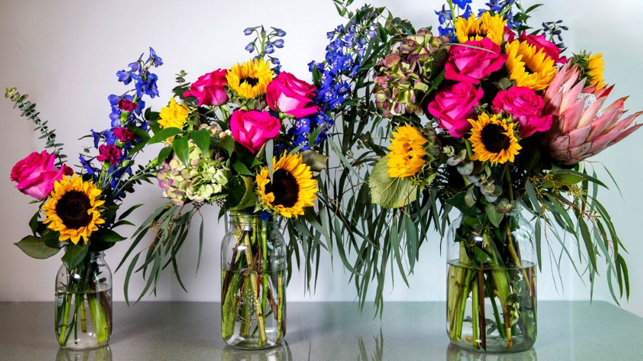 Curbside Chronicle Selling Flowers For Mother's Day