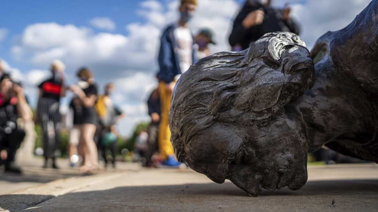 Fallen Christopher Columbus statue in Minnesota